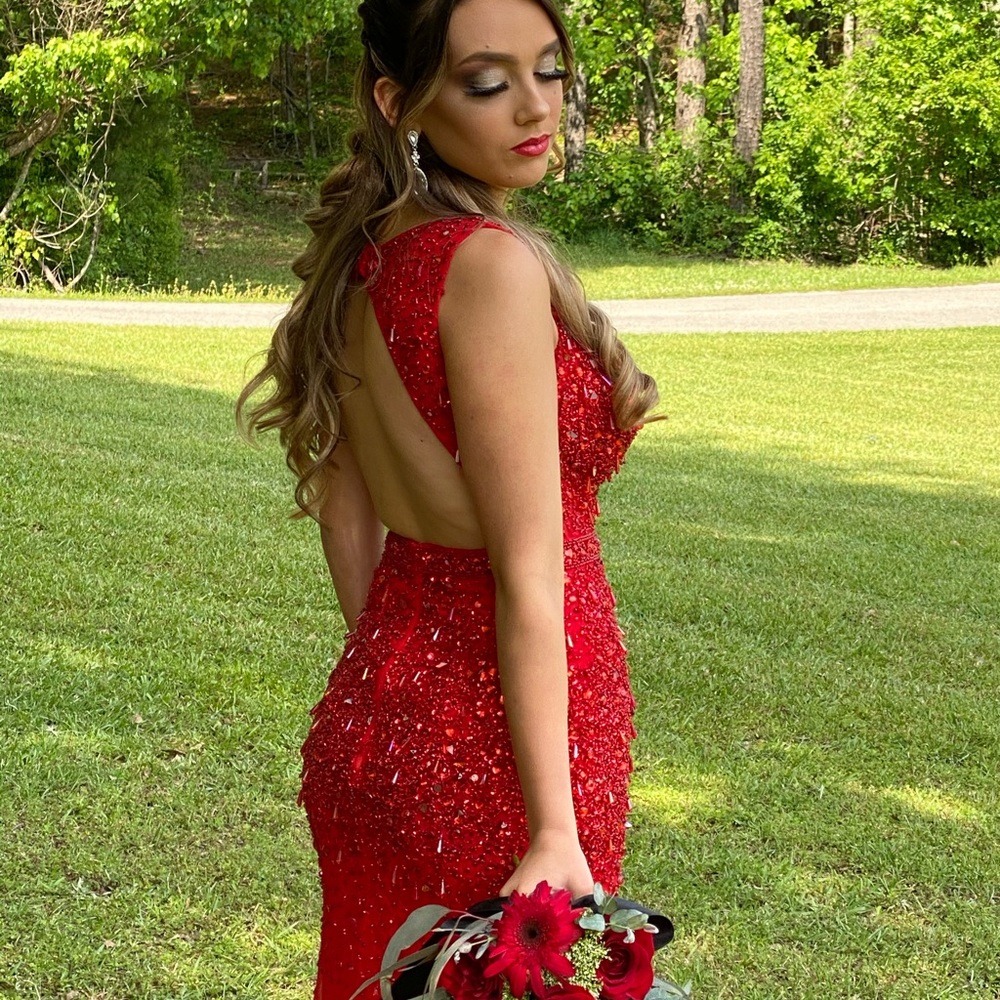 Beautiful red prom dress with beautiful detailing!